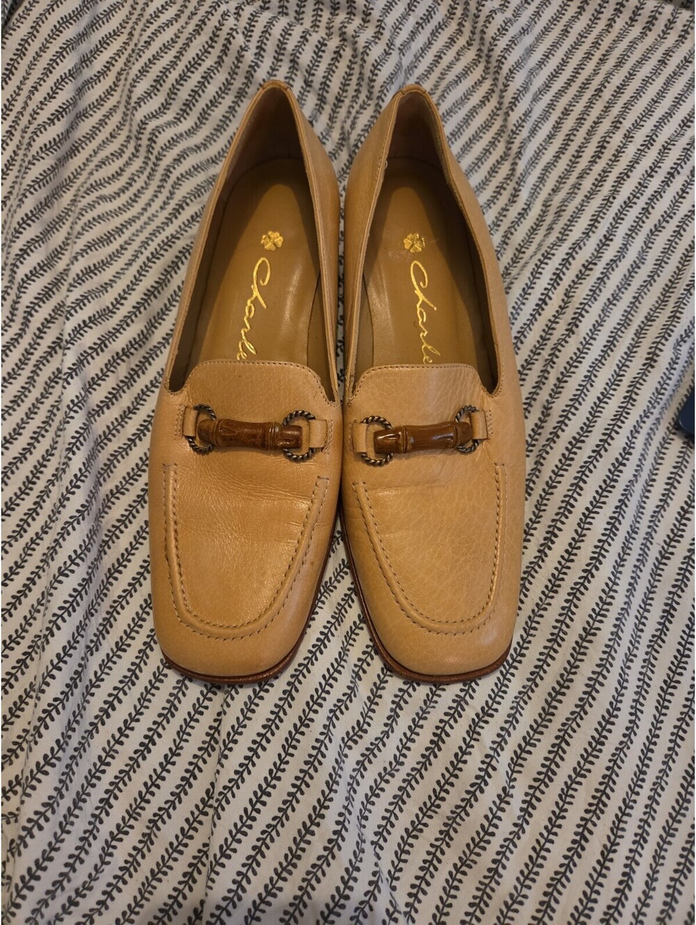 tan leather horsebit loafers from the footwear brand Charles by Charles David...